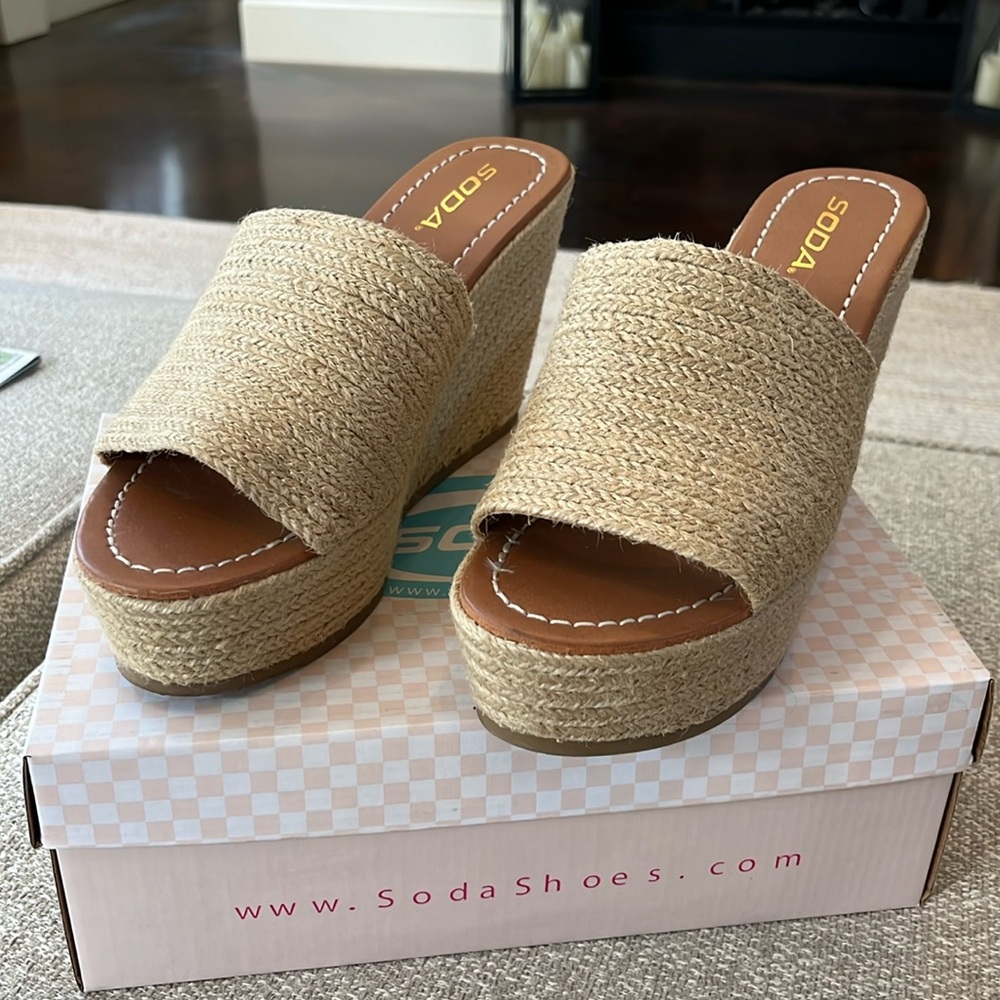 Worn once Size 9 women's 4" wedge, colors jute tan.